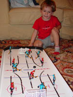 Alex playing Hockey