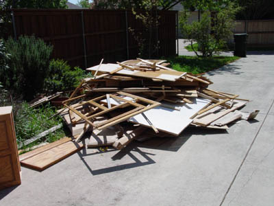 Cabinet junk in driveway