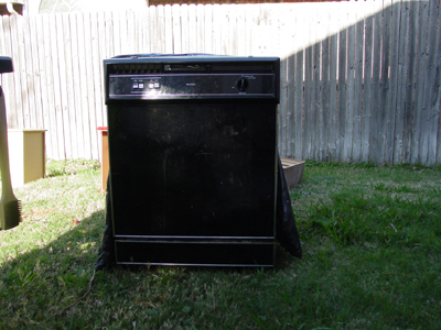 Dishwasher in Backyard.